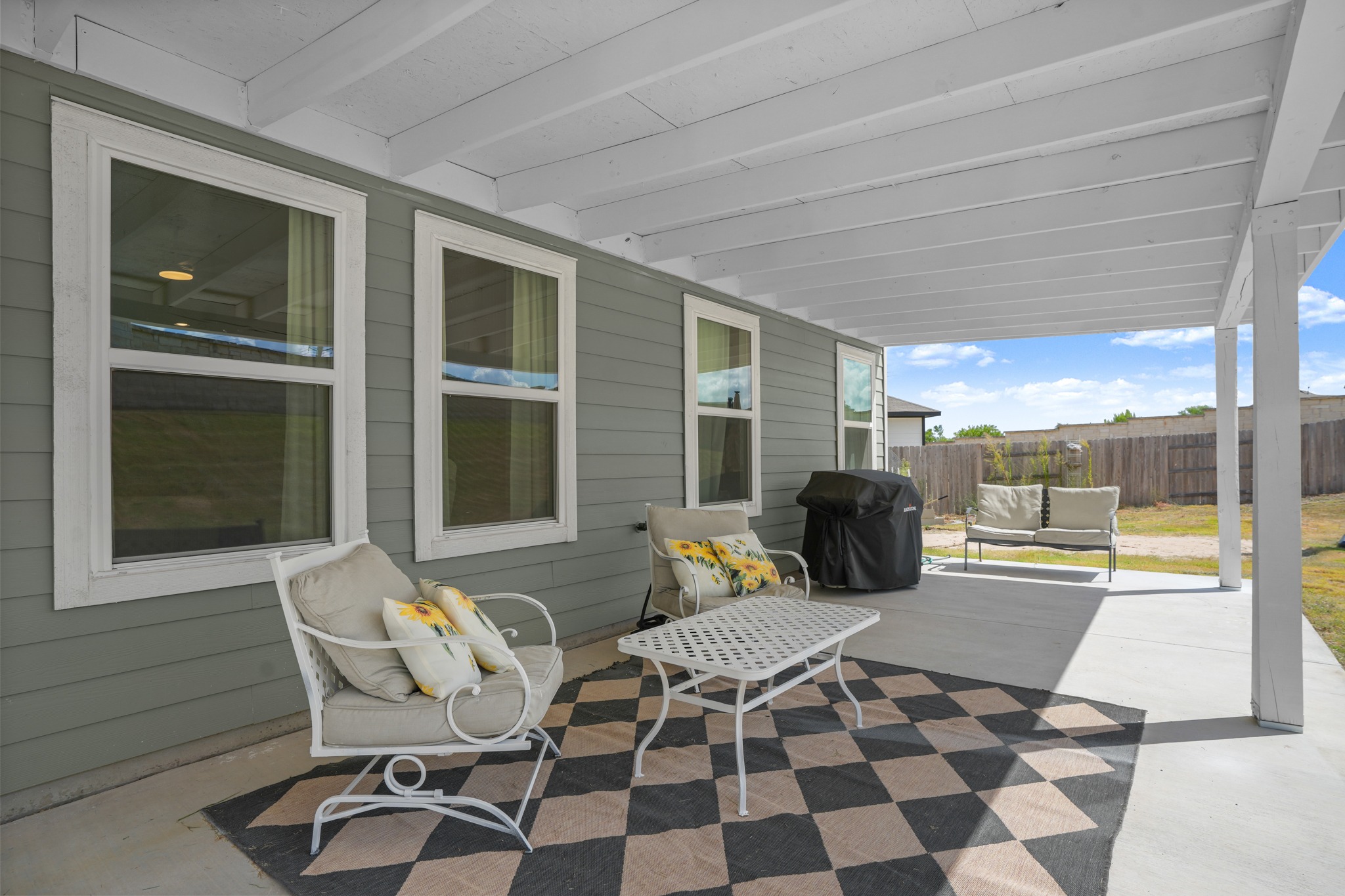 Covered rear patio at 5521 Sacra Cove
